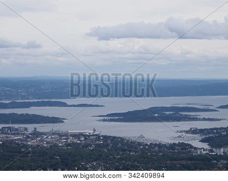 Landscapes Of Fjord Near European Town Of Oslo In Holmenkollen District In Norway With Cloudy Sky In