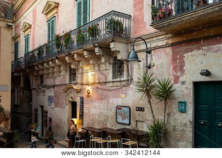 Matera, Italy - September 14, 2019: Evening View Of The City Of Matera, Italy, With The Colorful Lig