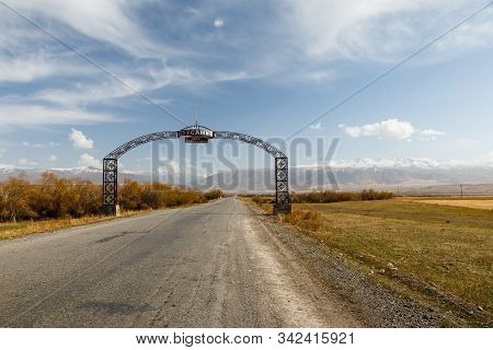 Suusamyr, Kyrgyzstan - October 06, 2019: Welcome To Suusamyr. Road Sign At The Entrance To The Villa