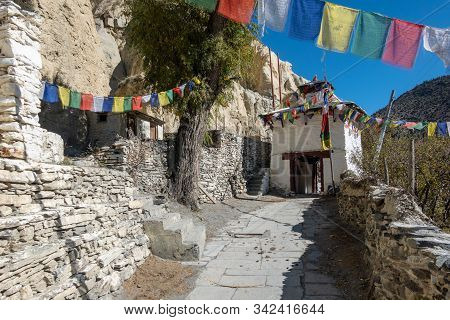A Buddhist Chorten Stupa Entrance Into The Small Town Of Marpha In The Himalaya Mountains Of Nepal.