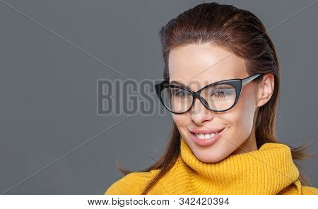 Young Smart Brunette Caucasian Woman In Eyeglasses Portrait