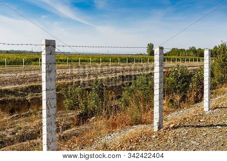 State Border Between Kyrgyzstan And Uzbekistan, Barbed Wire Fence