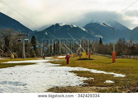 Bansko, Bulgaria - December 27, 2019: Ski Resort Center In Bulgaria. Cableway For Climbing The Mount
