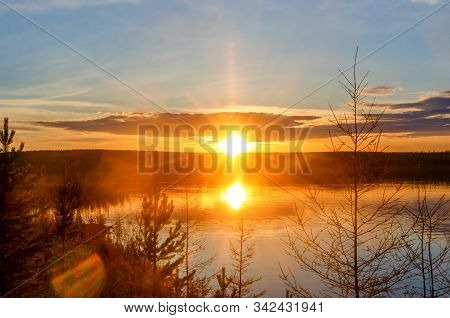 Bright Colorful Sunset With A Sunbeam On The Vilyuy River In The Northern Taiga Of Yakutia Suntar Ag
