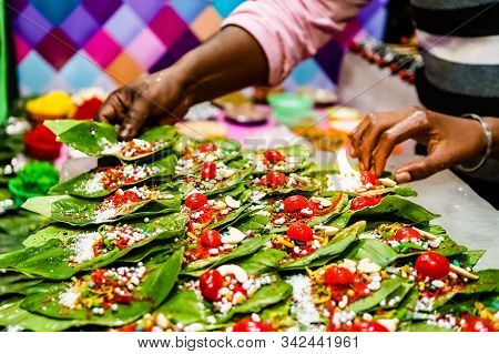 Collection Of Betel Leaf Banarasi Paan And Fire Paan Displayed For Sale At A Shop.