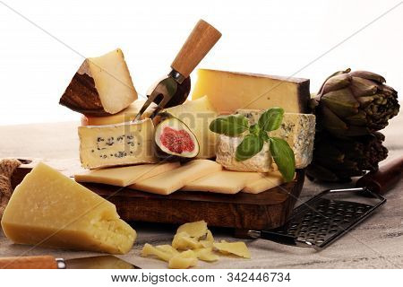 Different Sorts Of Cheese. Cheese Platter With Different Cheese And Spices