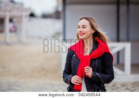 Happy Slylish Trendy Hipster Woman With Red Lips In Rock Black Leather Jacket Outdoors In The City B