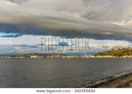 A View Of Condos At Alki Beach And The Seattle Skyline.