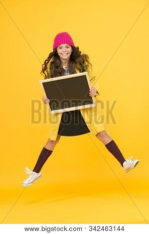 Copy Space For Ad. Happy Pupil Kid Jumping. Back To School. Desire For Study. Smiling Child Jump. Re