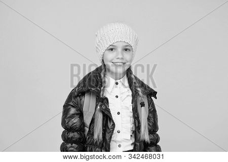 Future Focused Learning. Happy Little Schoolgirl Smiling On Yellow Background. Small Child In Autumn