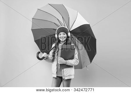 Rain Forecast On September 1. Cute Schoolgirl Colorful Umbrella On September 1. Small Child Go To Li