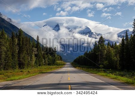 Beautiful View Of Yellowhead Highway With Mount Robson In The Background During A Cloudy Summer Morn