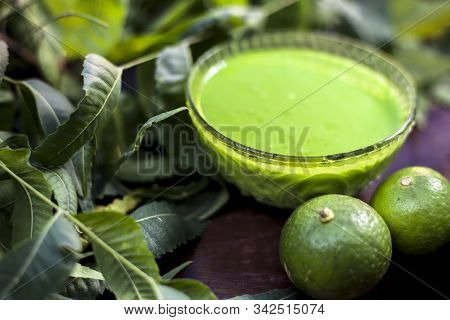 Hair Remedy Of All-purpose Ayurvedic Medicinal Herb I.e. Neem Or Nim Or Indian Lilac In A Glass Bowl