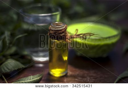Hair Remedy Of All-purpose Ayurvedic Medicinal Herb I.e. Neem Or Nim Or Indian Lilac In A Glass Bowl