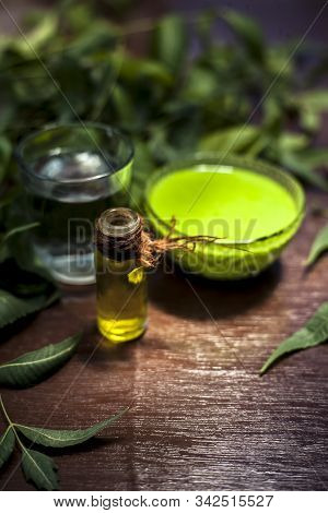 Hair Remedy Of All-purpose Ayurvedic Medicinal Herb I.e. Neem Or Nim Or Indian Lilac In A Glass Bowl