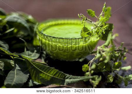 Hair Remedy Of All-purpose Ayurvedic Medicinal Herb I.e. Neem Or Nim Or Indian Lilac In A Glass Bowl
