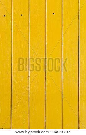 A textura de madeira na cor amarela, padrão