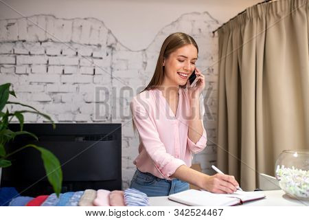 Atelier Administrator Taking A New Order From The Client