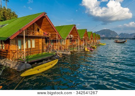 Surat Thani, Thailand - 28 December 2019 - Tour Boat Arrives At A Floating Resort To Pick Up Travell