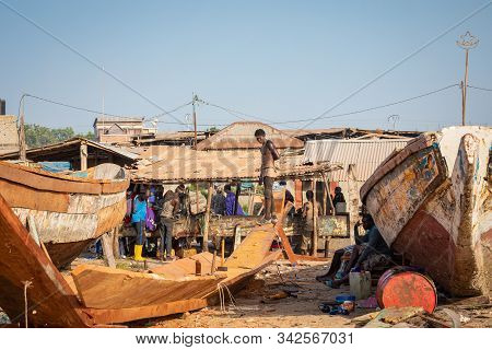 Tanji, The Gambia - November 21, 2019: Traditional Fishing Boats In Tanji. Fishing Village. Gambia,