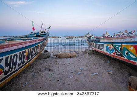 Tanji, The Gambia - November 21, 2019: Traditional Fishing Boats In Tanji. Fishing Village. Gambia,