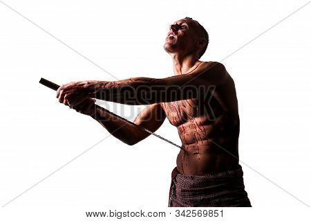 A Man With A Katana, In Blood, Makes Hara-kiri. Isolated On A White Background.