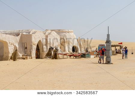 Naftah, Tunisia - July 23, 2018: People And The Fake Costumes Of Darth Vader From Star Wars, Tunisia
