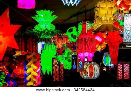Different Colored Paper Chinese Electric Night Lamp Hanging From The Ceiling On The Occasion Of Chin