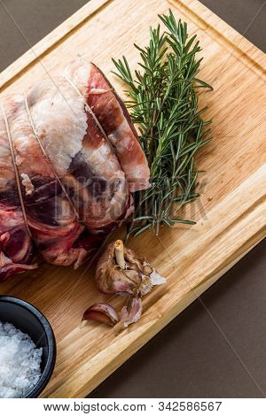 Lake District Uk Herdwick Sheep Raw Lamb Joint Rolled With Butchers String On Wood Chopping Board Wi