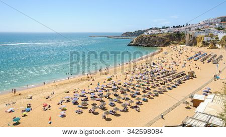 View Of Sunny Public Beach In Albufeira, Algarve, Portugal