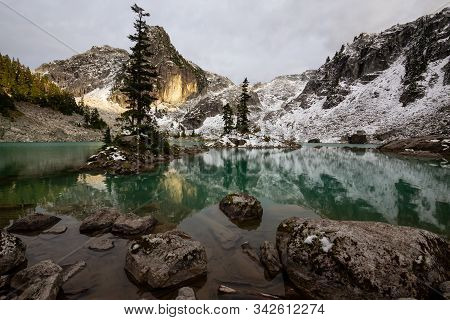 Beautiful View Of A Glacier Lake In The Canadian Mountain Landscape During A Colorful And Vibrant Su