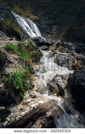 Nature Rainforest River Cascade. Mountain Stream In Nature. Spring Stream In Mountain Nature. Nature