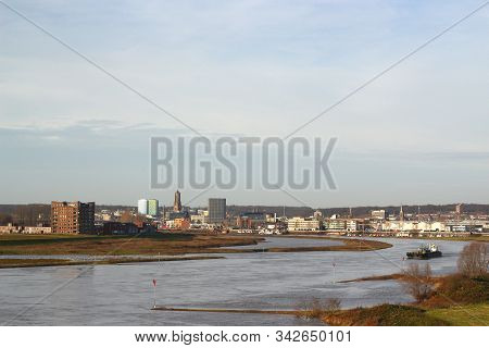 Arnhem, Netherlands - December 19, 2019: View At The River Rhine And The Skyline Of The City Arnhem