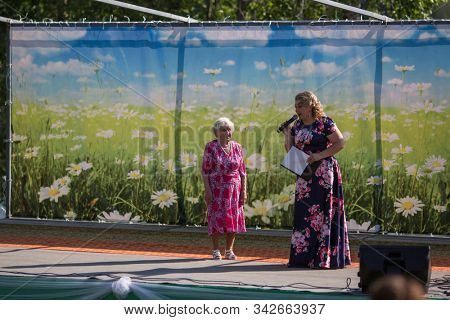 NIKOLSKIY / LENINGRAD REG, RUSSIA - JUN 16, 2018: During festival events dedicated to 69th anniversary of urban-type settlement Nikolskiy formation on the river Svir connecting Onega and Ladoga lakes.