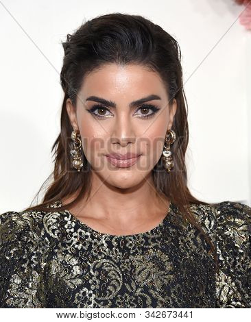 LOS ANGELES - NOV 15:  Camila Coelho arrives for the 2019 REVOLVE Awards on November 15, 2019 in Los Angeles, CA                