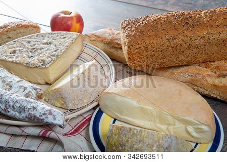 Cheeses And Tomme De Savoie, French Cheese Savoy,a French Alps France.
