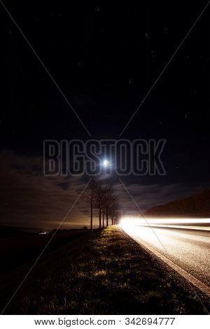 Traffic By Night Under Clear Starry Sky Night