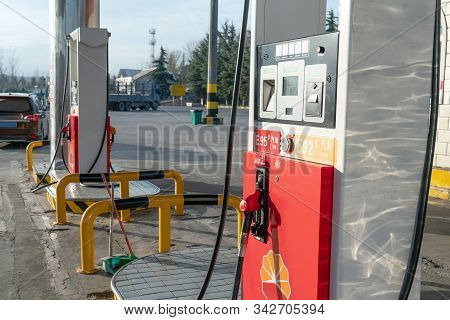 Xian, China - December 29, 2019: Chinese Petrol Station Supplying Gasoline For Refueling A Car With