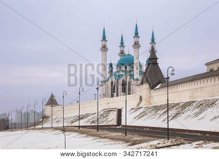 Kazan, Cityscape. Wall And Towers Of The Kazan Kremlin And Kul Sharif Mosque On A Cloudy Winter Day.