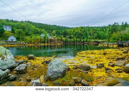 Views Of The Bay, Boats And Waterfront Buildings In The Fishing Village Aspotogan, Nova Scotia, Cana