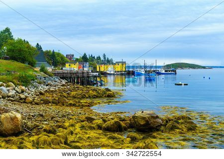 Views Of The Bay, Boats And Waterfront Buildings In Northwest Cove, Nova Scotia, Canada