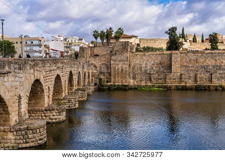 Merida, Spain - November 05, 2019: Puente Romano, The Roman Bridge In Merida. It Is The Longest Surv