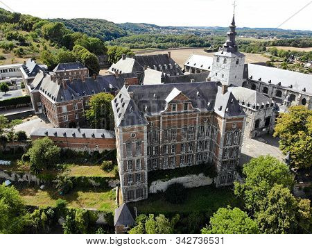 Aerial View Of Floreffe Abbey During Summer Day, Belgium. Old Abbey Where They Produced Famous Flore