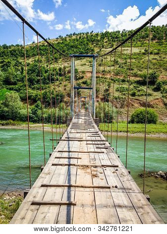Old Bridge Over Black Drin River In Albania In Summer