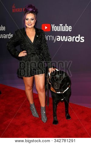 LOS ANGELES - DEC 13:  Molly Burke, Dog Gallop at the 9th Annual Streamy Awards at the Beverly Hilton Hotel on December 13, 2017 in Beverly Hills, CA