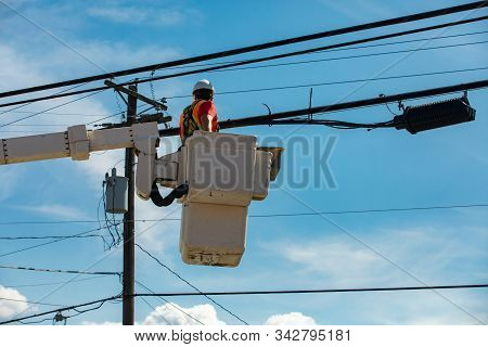 Health And Safety In The Construction And Maintenance Industry As A Workman Is Seen From Below In A 