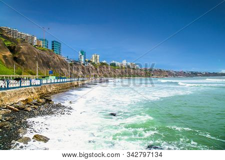 lima, Peru-Jan 11, 2019:Pacific coast view in sunny day, observation deck, stairway to the beach. View from the Public park in Miraflores district. Lima, Peru. 