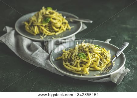 Spaghetti Pasta Bucatini With Pesto Sauce And Parmesan. Italian Traditional Perciatelli Pasta By Gen