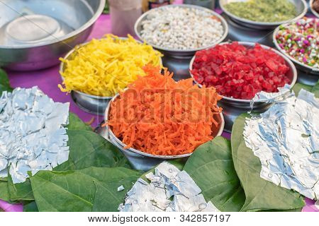 Different Types Of Colorful Garnish Pan Masala Used To Decorate Betel Leaf Banarasi Paan With Select