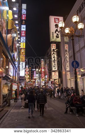 Osaka, Japan- 27 Nov, 2019: Beautiful Landscape View Of Japanese Store With Crowd Of Peoples And Tou
